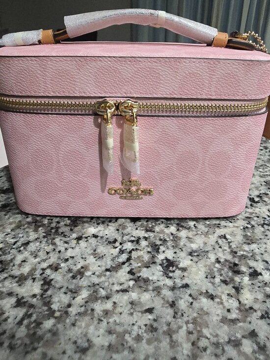 Coach Handbags - SOLD Coach Powder Pink Cosmetic bag